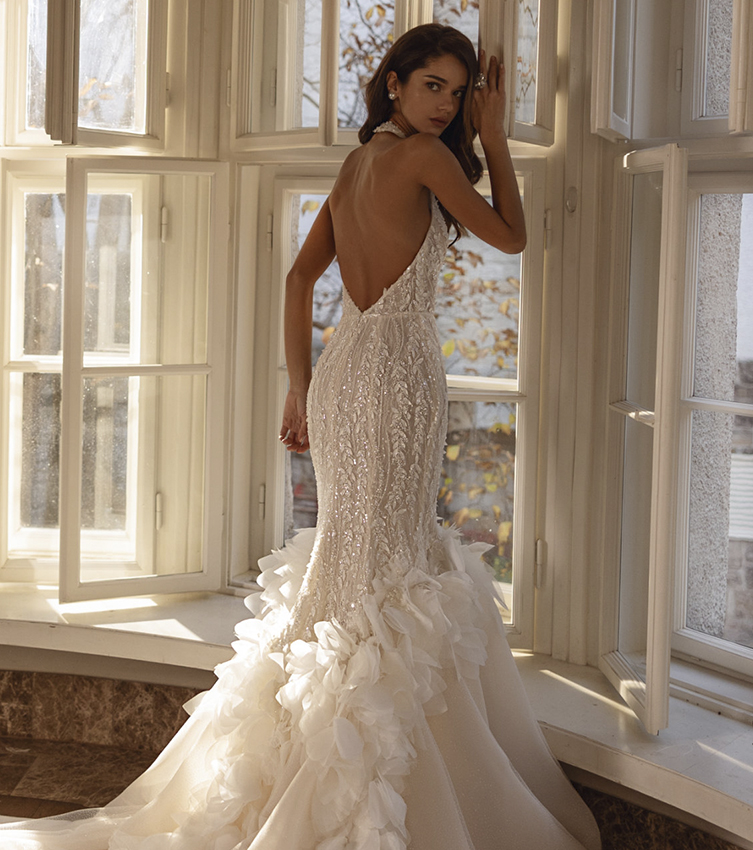 Bride in a lace wedding dress with a deep V-neck